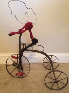 Wire Girl on Tricycle