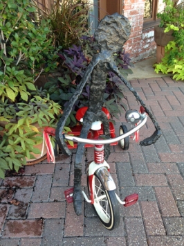 Bronze Figure on Tricycle